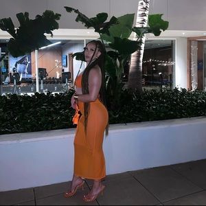 Bright orange see through dress. Size M.